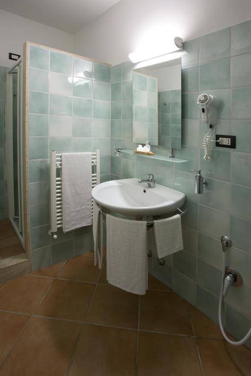 Hotel Vila Bahia Numana Quarto foto